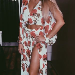 White Floral Akira jumpsuit open in the front